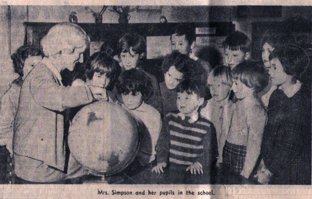 Miss Simpson and her pupils in the school in the early 1960s.